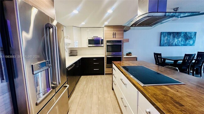 Building Photo - 19390 Collins Ave