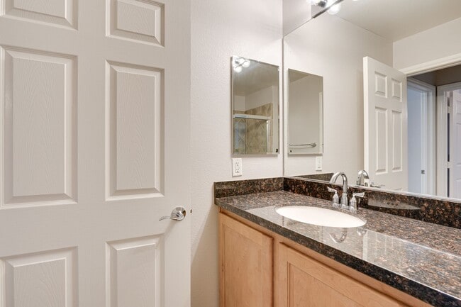 Building Photo - Luxury Guard-Gated 2-Bedroom Condo with Private Garage & Resort Amenities!