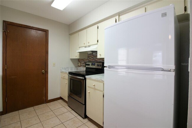Building Photo - 6309 Highland Gardens Ct