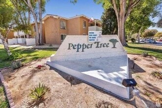 Building Photo - Spacious 2-bedroom 1-bathroom upstairs condo with Balcony/Garage