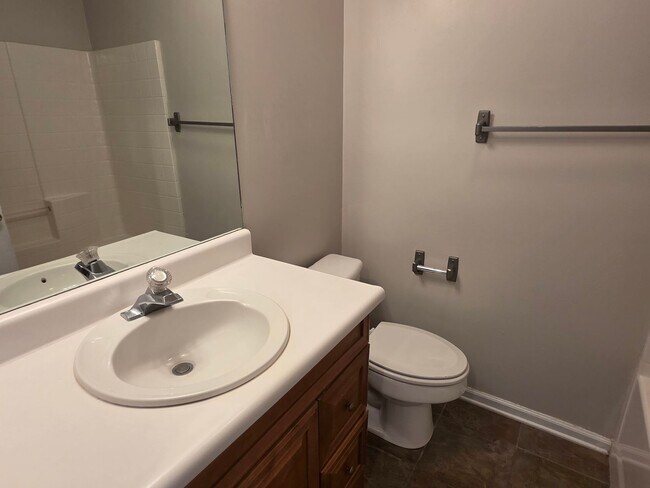 Building Photo - Woodbury Subdivision. 3 bedrooms. 2 baths. Converted garage to bonus room. Family with vaulted ce...