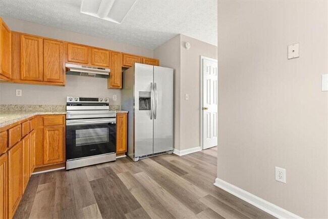 Building Photo - 5696 Windfall Ln