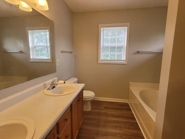 Building Photo - LVP floors, Large Yard!  3 BRM, 2 BHs, Double Garage!