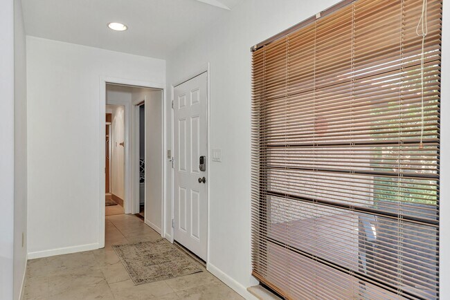 Building Photo - BEAUTIFUL 2 BEDROOM 2 BATHROOM + A DEN VILLA WITH GORGEOUS LAKE VIEWS!