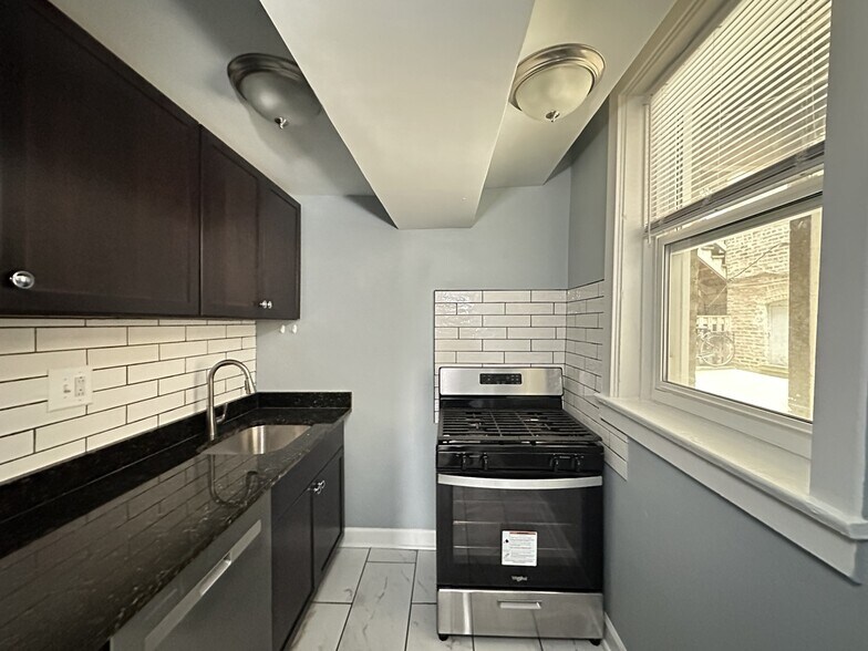 Building Photo - 5664 N Ridge Ave