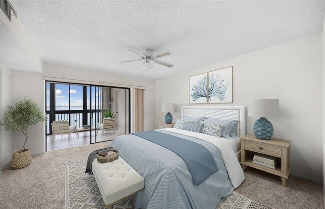 Larger bedroom with water front view - 250 S Sykes Creek Pky