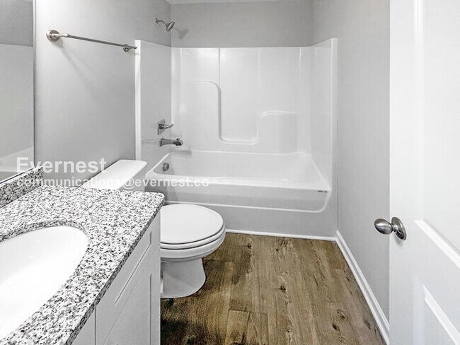 Building Photo - Limited Time Special Offer / 2 Bed/ 2.5 Bath Townhome with Off-Street Parking / Pet-Friendly / Co...