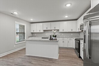 Building Photo - Reduced Rental Rate—Act Now!