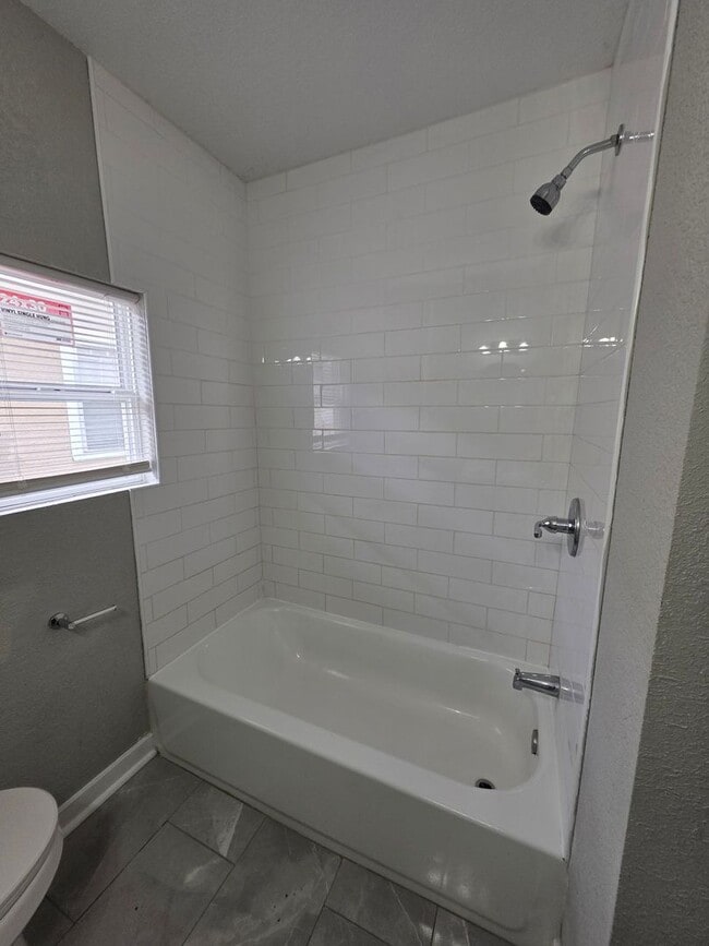 Building Photo - Spacious 4-Bedroom, 2.5-Bath Home with Hardwood Floors
