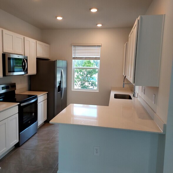 Modern Kitchen with quartz counter tops - 67 Sage Branch St