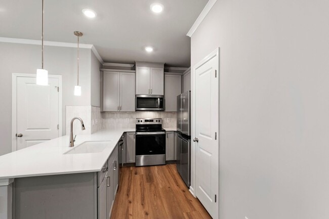 Building Photo - Modern 3-Bedroom Townhome with Luxury Fini...