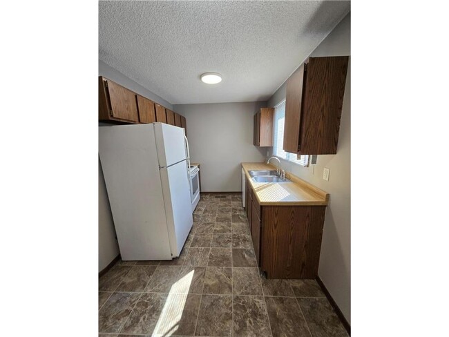 Building Photo - 6662 84th Ct N