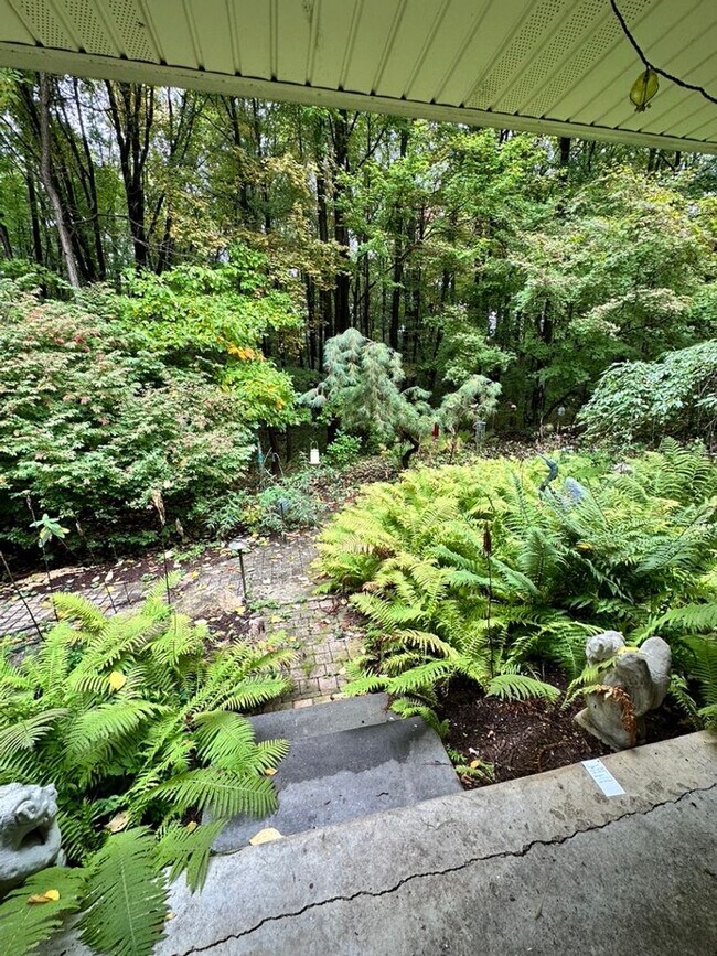 Building Photo - Dream Home in Highland, Michigan: Your Private Oasis on 5 Wooded Acres