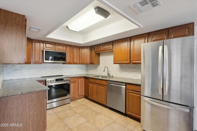 Building Photo - 7940 E Camelback Rd