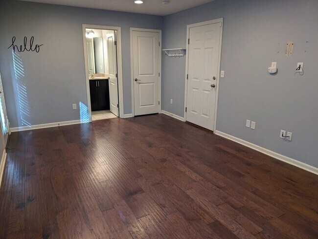 Building Photo - AVAILABLE NOW! Luxurious and Modern 3-4 Bedroom / 3.5 Bath Townhome in the Twin Lakes Community!
