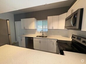 Building Photo - 1197 Colonial Palms Way