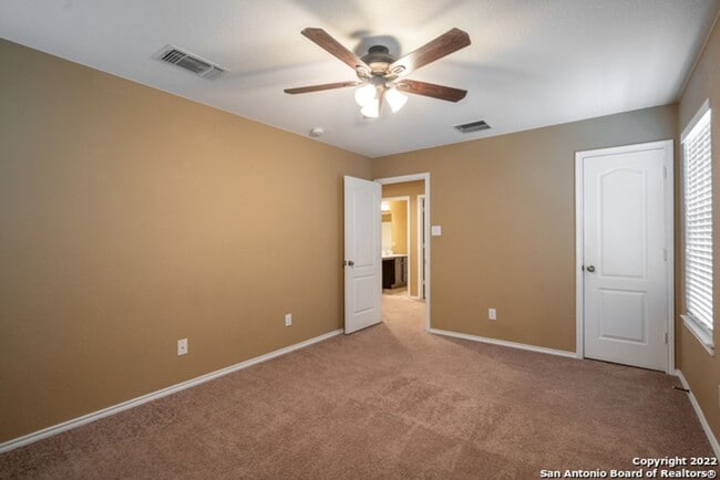 Building Photo - Comfortable Living in a Gated Community Near It All
