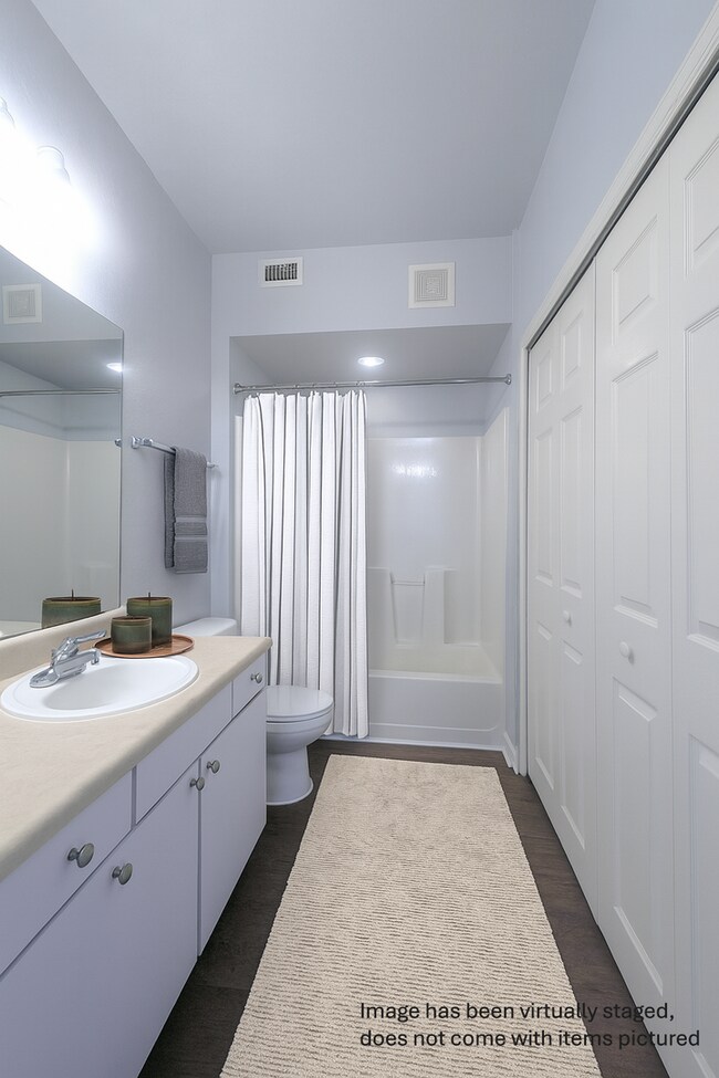 Building Photo - 2x2 New flooring throughout! Updated, spacious, comfortable with balconette!