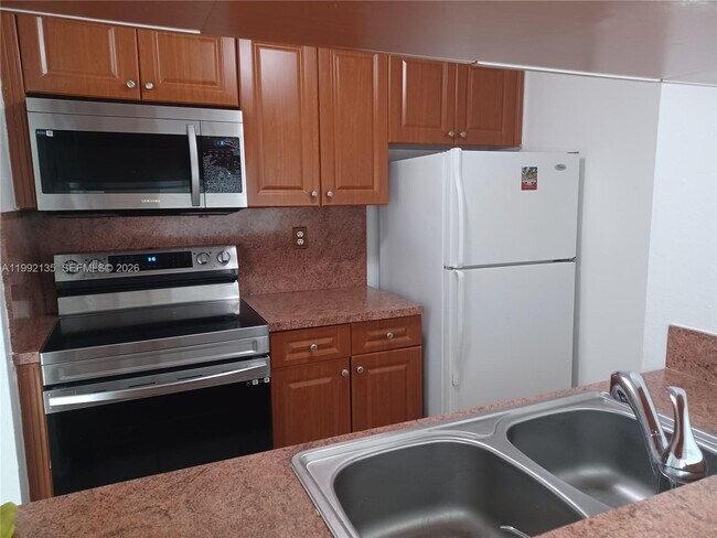 Building Photo - 8004 SW 149th Ave