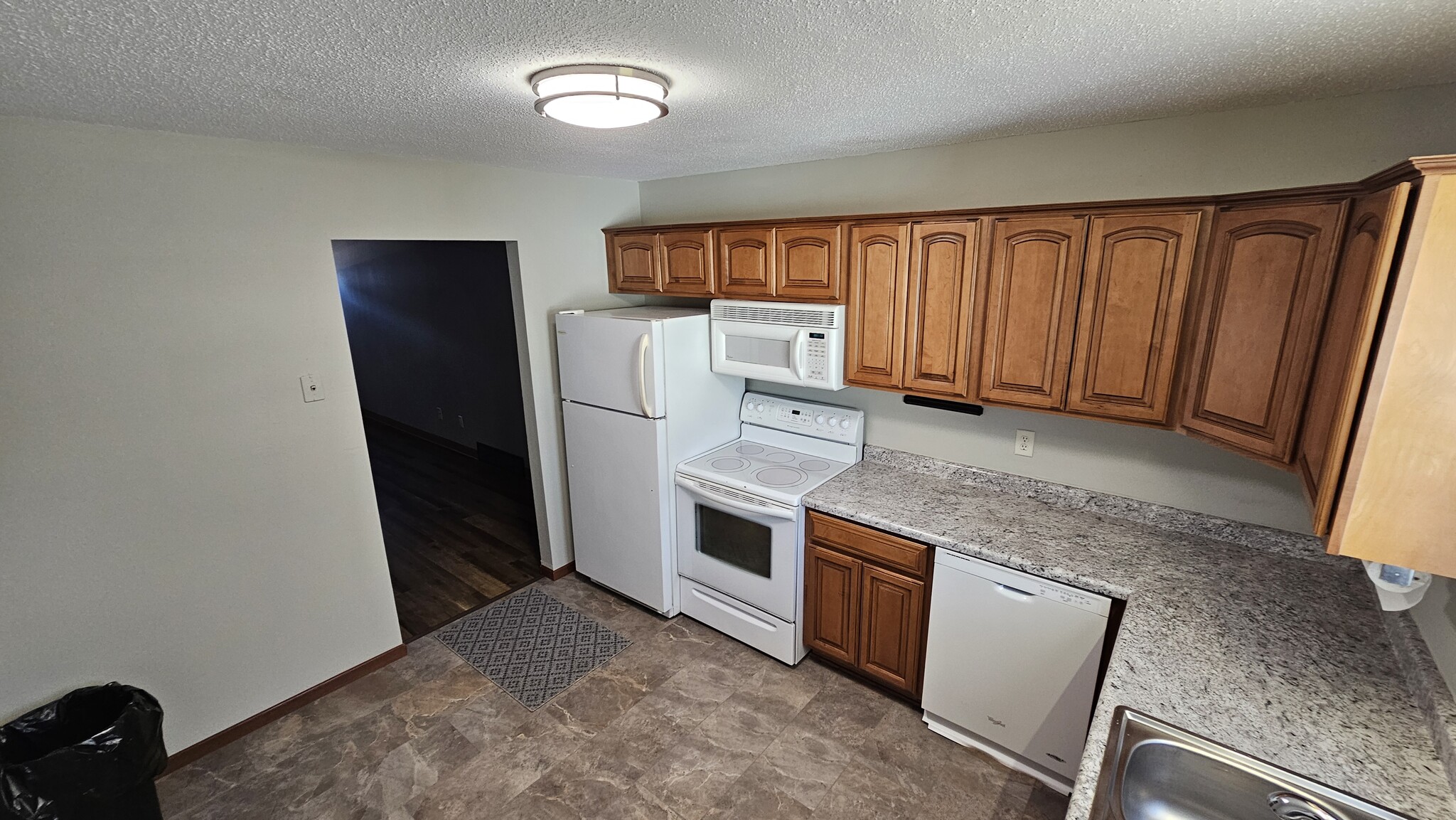 Kitchen entry to Living Room - 3111 S Mayfair Dr