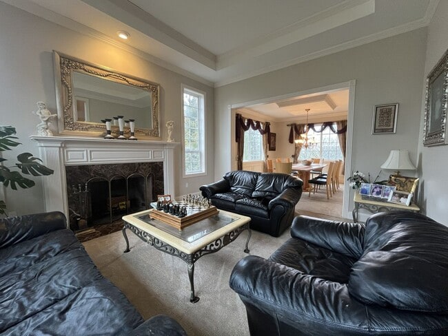 Building Photo - Executive-Style Northwest Heights Home with Forest Views and Refined Architectural Details