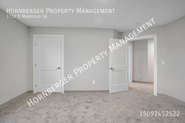 Building Photo - 1719 N Manifold Ln