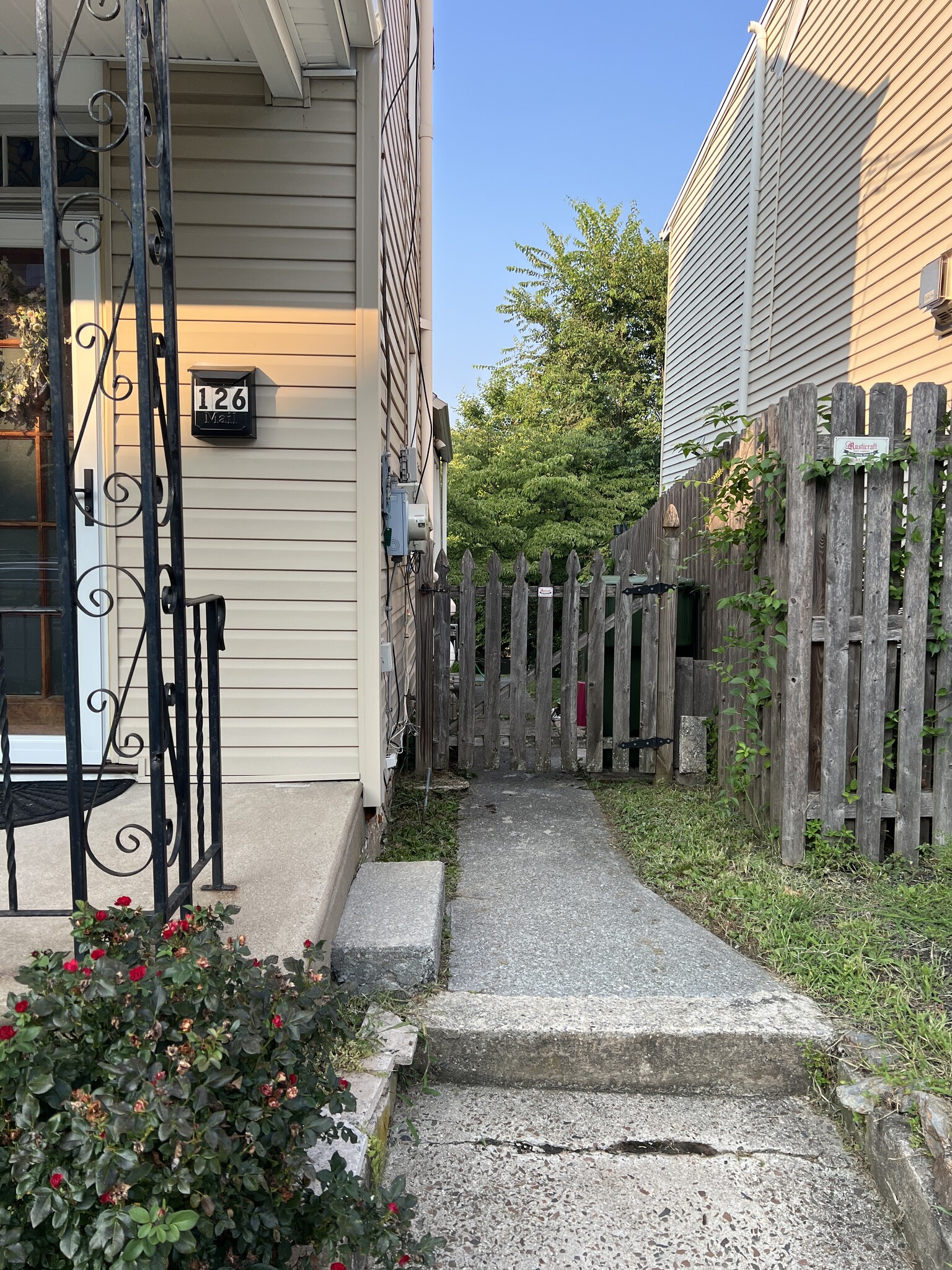 A view of the front gate. - 126 Merion Ave