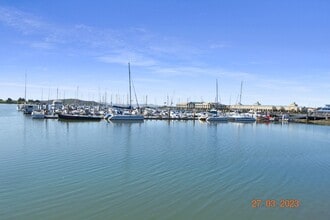 Building Photo - Beautiful and Quiet Gated Community steps from the Marina!