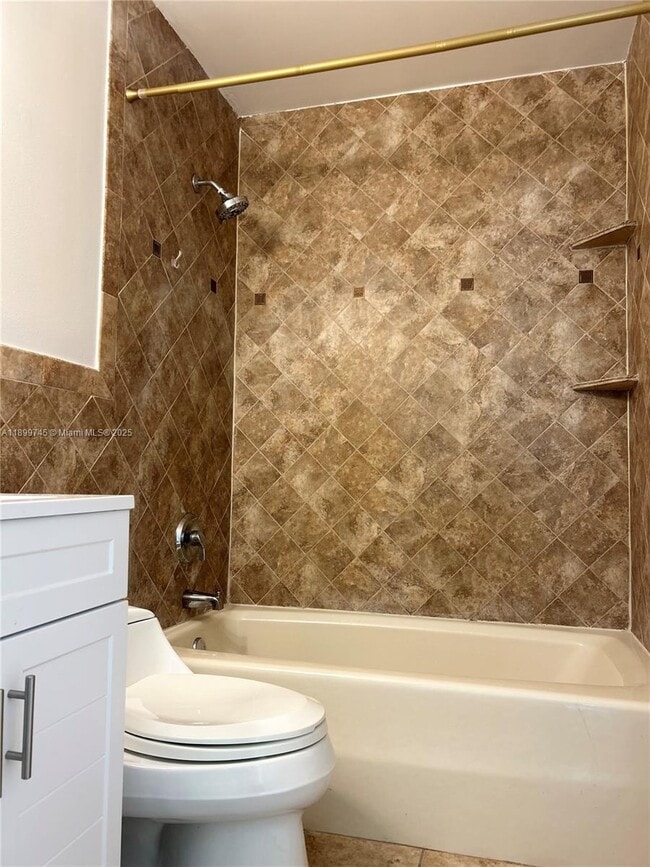 Building Photo - 6452 Royal Palm Beach Blvd