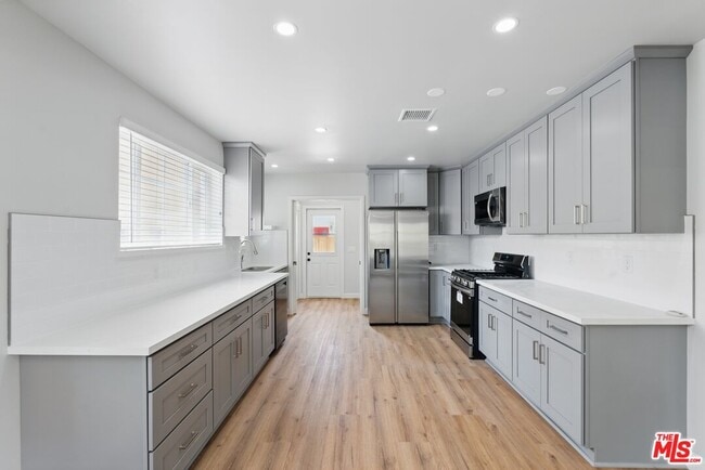 Building Photo - 1349 S Curson Ave
