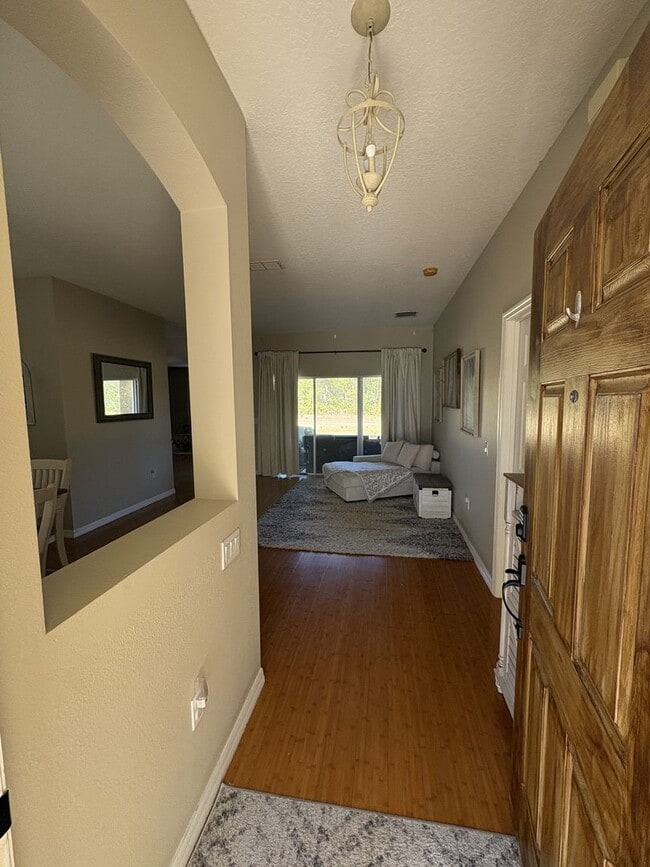 Building Photo - Florida Living Starts Here — Gated, Single-Story, Move-In Ready May 1!