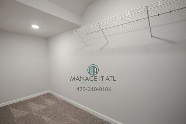 Building Photo - Modern 3-level Townhome featuring 4 bedroo...