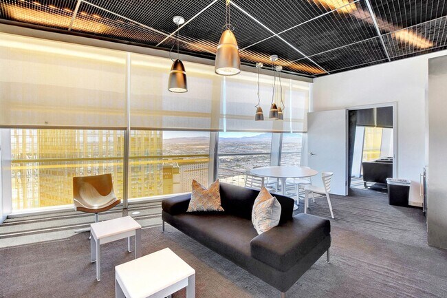 Building Photo - Stunning Strip Views from this Fully Furnished Studio Residence.