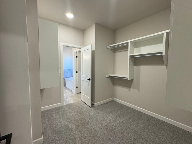 Building Photo - BRAND NEW - 4 bed - 3 bath - 2 car with fenced yard!