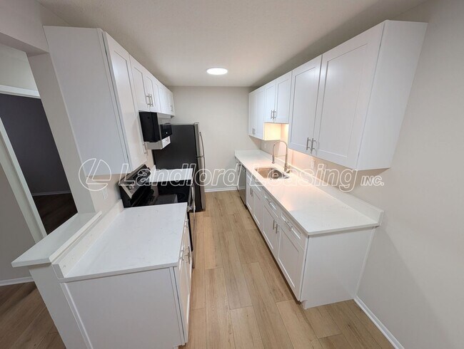 Building Photo - Reduced Price on this Updated 2-Bedroom Condo Steps from Crocker Park – Pool & Clubhouse