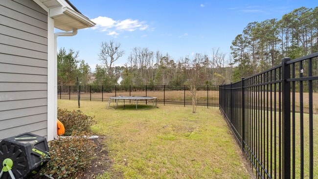 Building Photo - Spacious 6-Bedroom Waterfront Home in Richmond Hill, GA