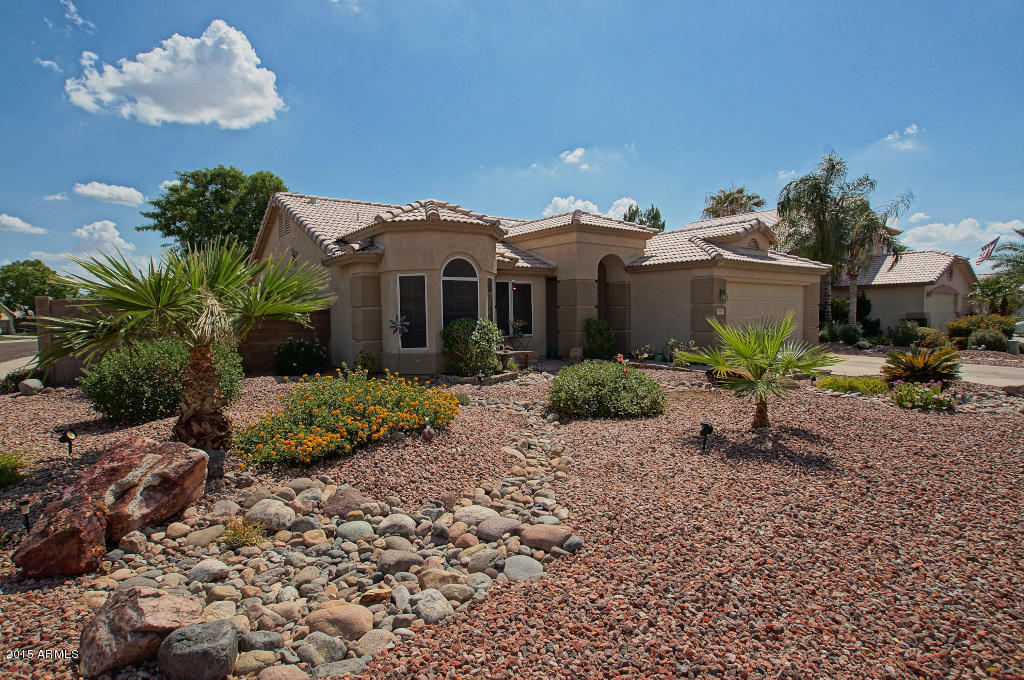 Professionally Landscaped both front & back. - 9139 W Davis Rd