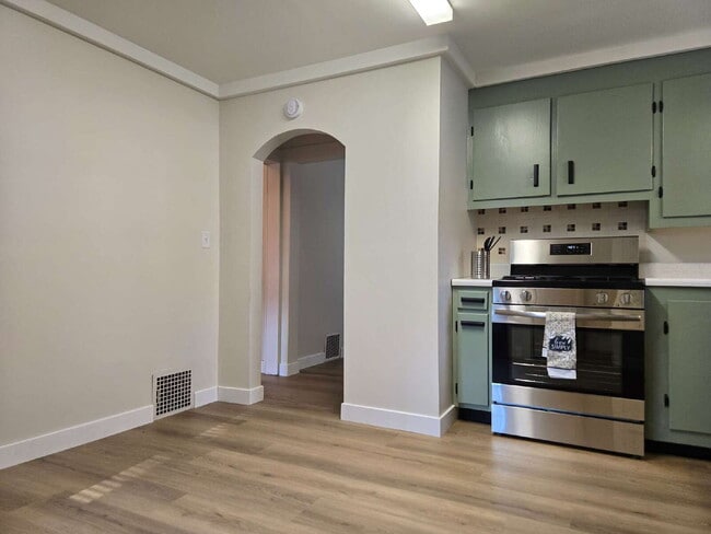 Building Photo - Room to Roam — Updated 2 Bed with Huge Yard & 2-Car Garage