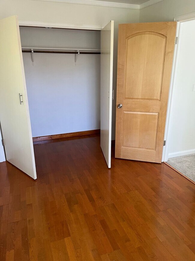Building Photo - 4 Bedroom Gardener's Delight With Rooftop Patio, Privacy and Covered Parking