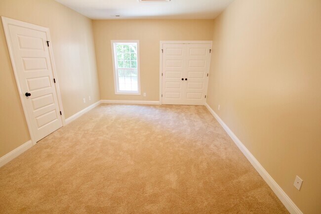 Building Photo - "Brand New Construction."  Quiet location, charming, cozy 3 bedroom duplex