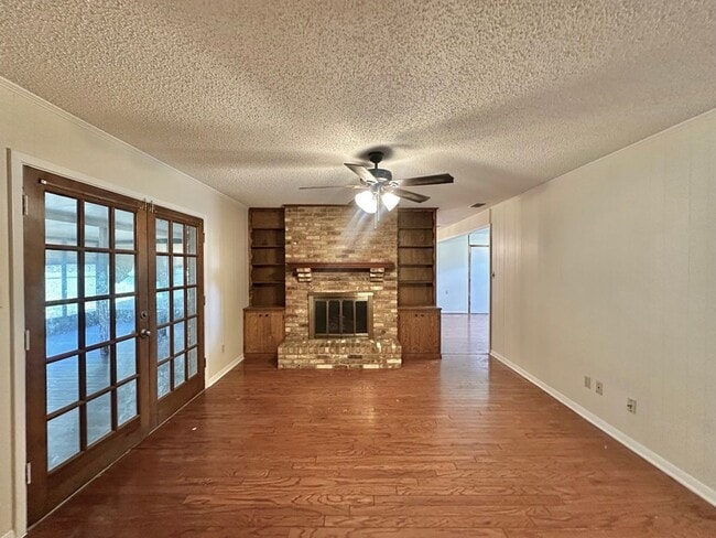 Building Photo - Spacious 4-Bedroom Home on a Corner Lot wi...