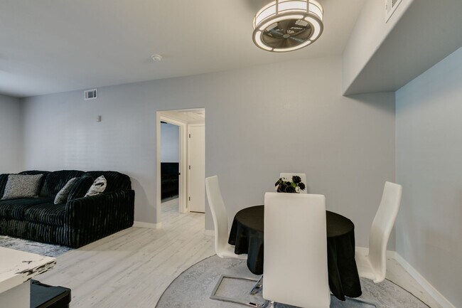 Building Photo - Stylish Fully Furnished 1BR Condo with Private Patio & Custom Closet