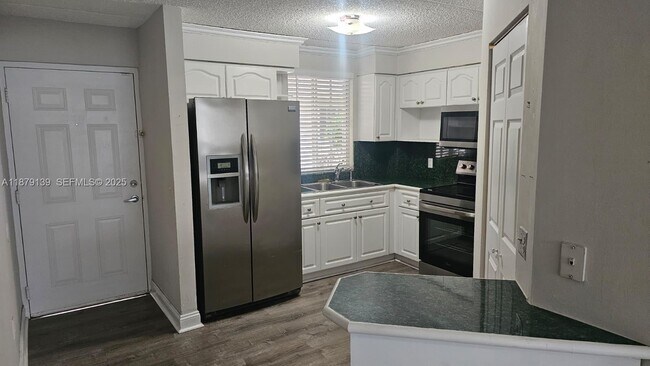 Building Photo - 6115 NW 186th St