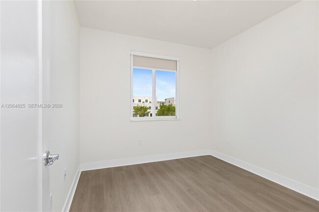Building Photo - 6416 NW 102nd Ct