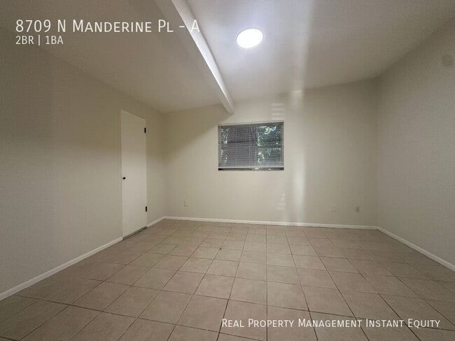 Building Photo - 8709 N Mandarine Pl