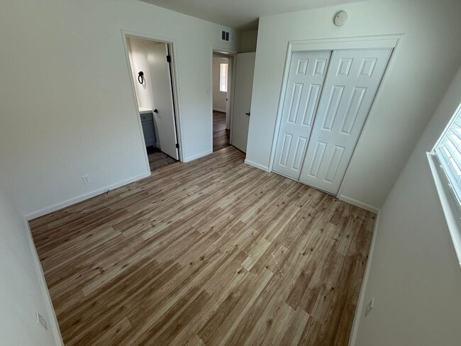 Building Photo - Updated Property with Large Front & Backyard