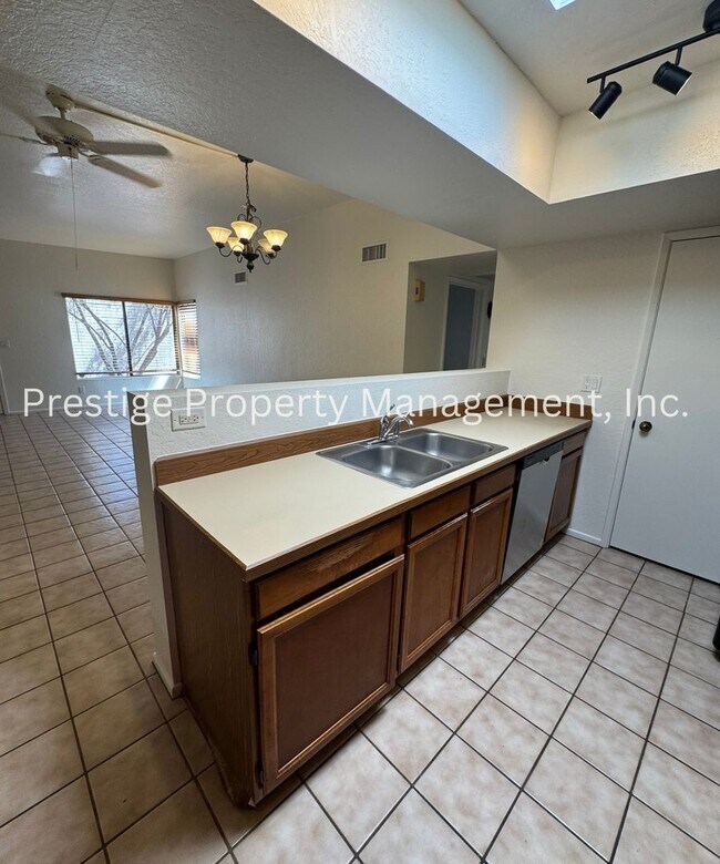 Building Photo - Totaling 3/3 With The Guest House; This Lovely Central Townhome is Everything You Need!