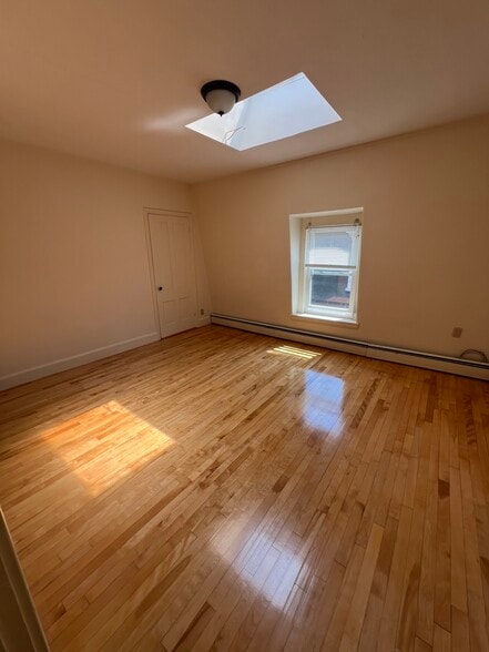 Living room with Skylight - 130 Emery St