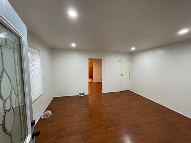 The living room provides dry basement access - 212 Lorenz Ave