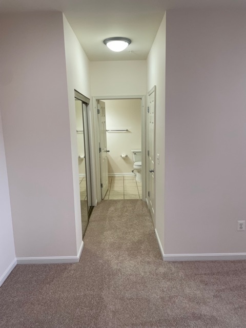 MBR bathroom, closets to left and right. - 4860 Eisenhower Ave